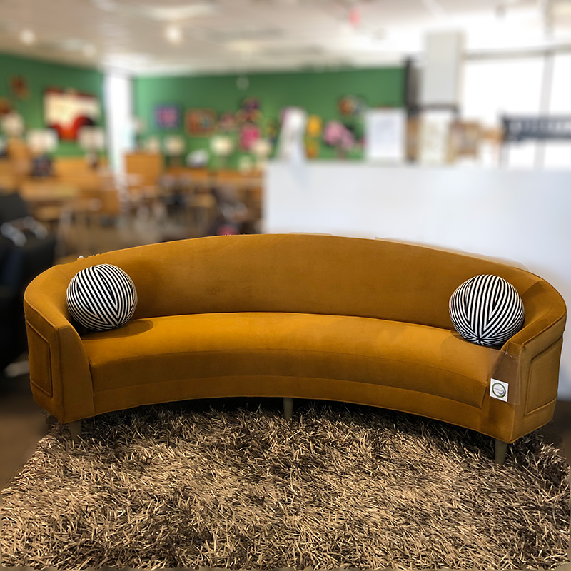 Kinetic sofa with pillows